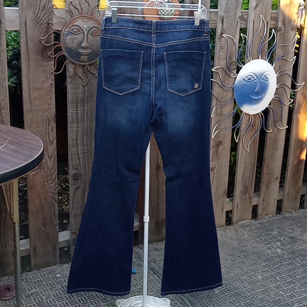 Woman's jeans , blue distressed highrise size 13/w30/L 32 1/2 Big bell.
